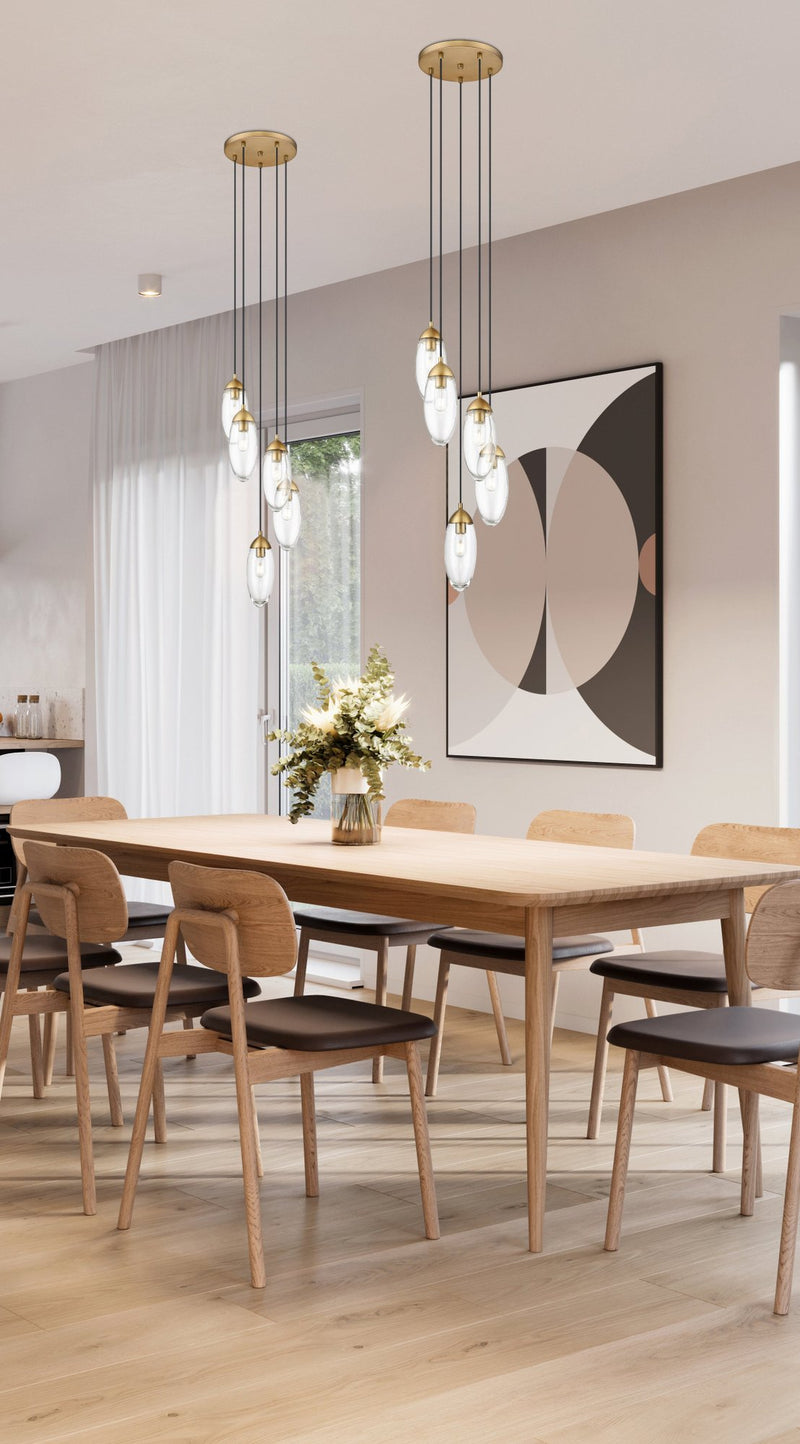 Arden 5 Light 12" Pendant in Rubbed Brass in a room setting