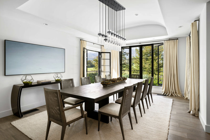 Fontaine 23 Light 54.5" Linear Pendant in Matte Black in a room setting