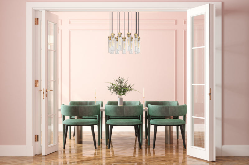 Beau 11 Light 24" Pendant in Rubbed Brass in a room setting