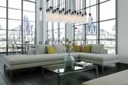 Beau 23 Light 54" Linear Pendant in Matte Black in a room setting