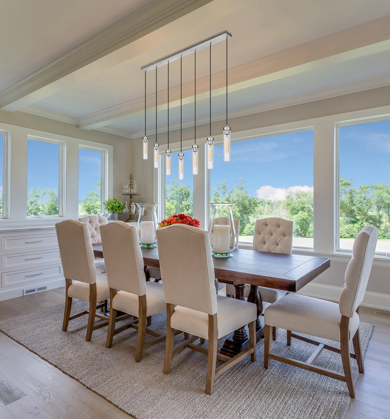Beau 7 Light 54" Linear Pendant in Brushed Nickel in a room setting