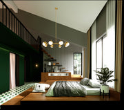 Realm Sphere 8 Light 44" Chandelier in Modern Gold in a room setting
