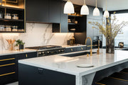 Naya 1 Light 8" Pendant in Modern Gold in a room setting