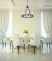 Titus 8 Light 33" Chandelier in Matte Black in a room setting