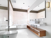 Baden 1 Light 10" Vanity in Brushed Nickel in a room setting