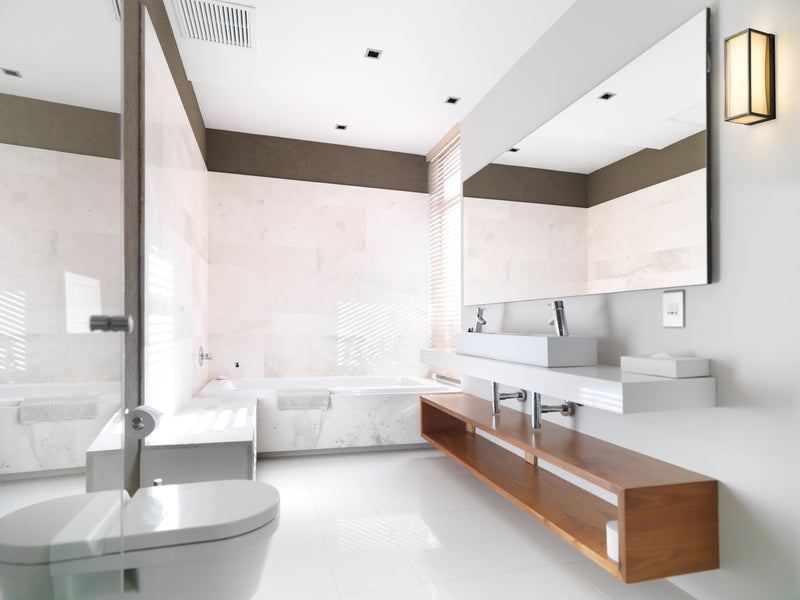 Baden 1 Light 10" Vanity in Brushed Nickel in a room setting