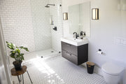 Baden 1 Light 10" Vanity in Matte Black in a room setting