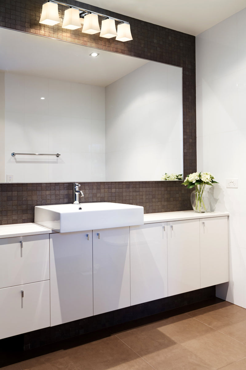 Darcy 5 Light 38" Vanity in Chrome in a room setting
