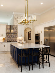 Callista 6 Light 43.5" Linear Pendant in Rubbed Brass in a room setting