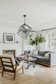 Euclid 6 Light 35.5" Chandelier in Matte Black in a room setting