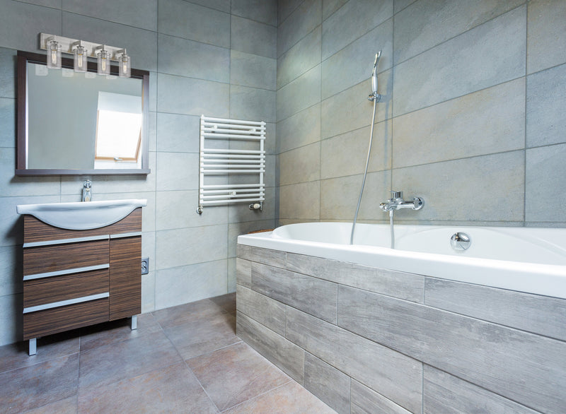 Savannah 4 Light 31.5" Vanity in Brushed Nickel in a room setting