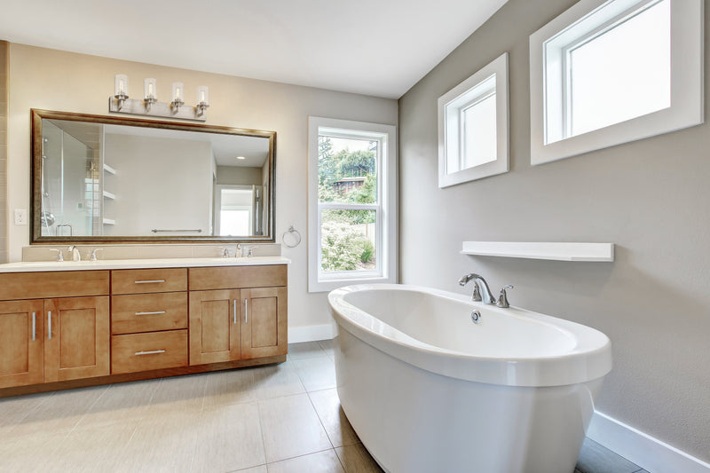 Savannah 4 Light 31.5" Vanity in Brushed Nickel in a room setting