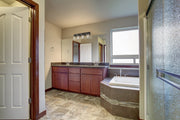 Savannah 4 Light 31.5" Vanity in Bronze in a room setting
