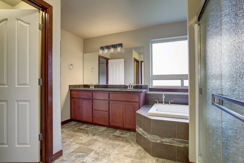 Savannah 4 Light 31.5" Vanity in Bronze in a room setting