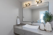 Parsons 2 Light 16" Vanity in Matte Black + Brushed Nickel in a room setting