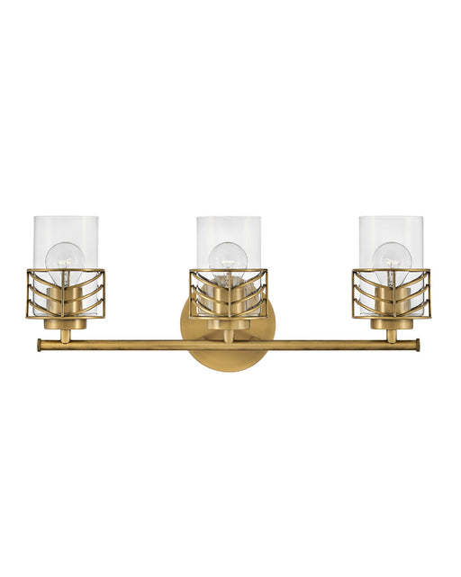 Della Three Light Vanity in Lacquered Brass by Hinkley Lighting