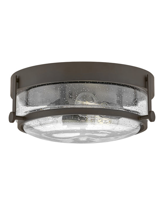 Harper LED Flush Mount in Oil Rubbed Bronze with Clear Seedy glass