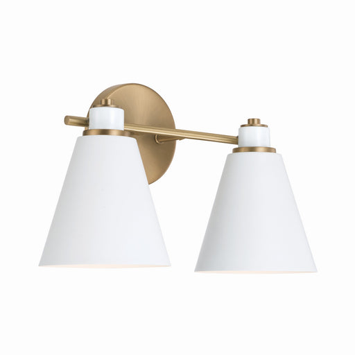 Bradley Two Light Vanity in Aged Brass and White