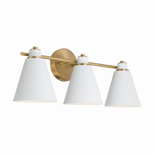 Bradley Three Light Vanity in Aged Brass and White