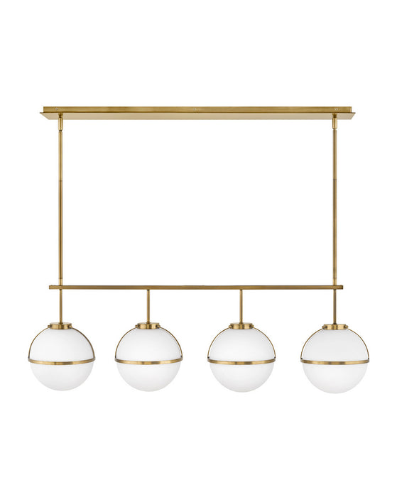 Hollis Four Light Linear Chandelier in Heritage Brass