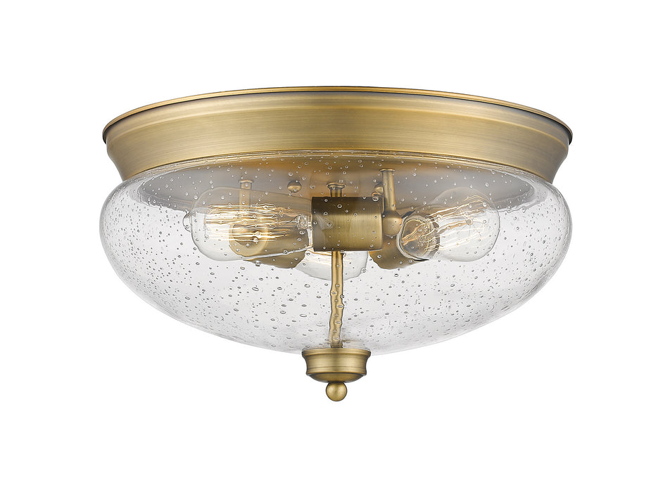 Amon 3 Light Flush Mount in Heritage Brass with Clear Seedy Glass